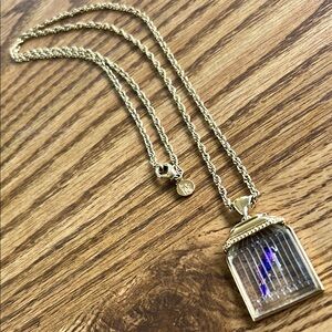 Gold Pendant Necklace with Prism purple bird in cage Design